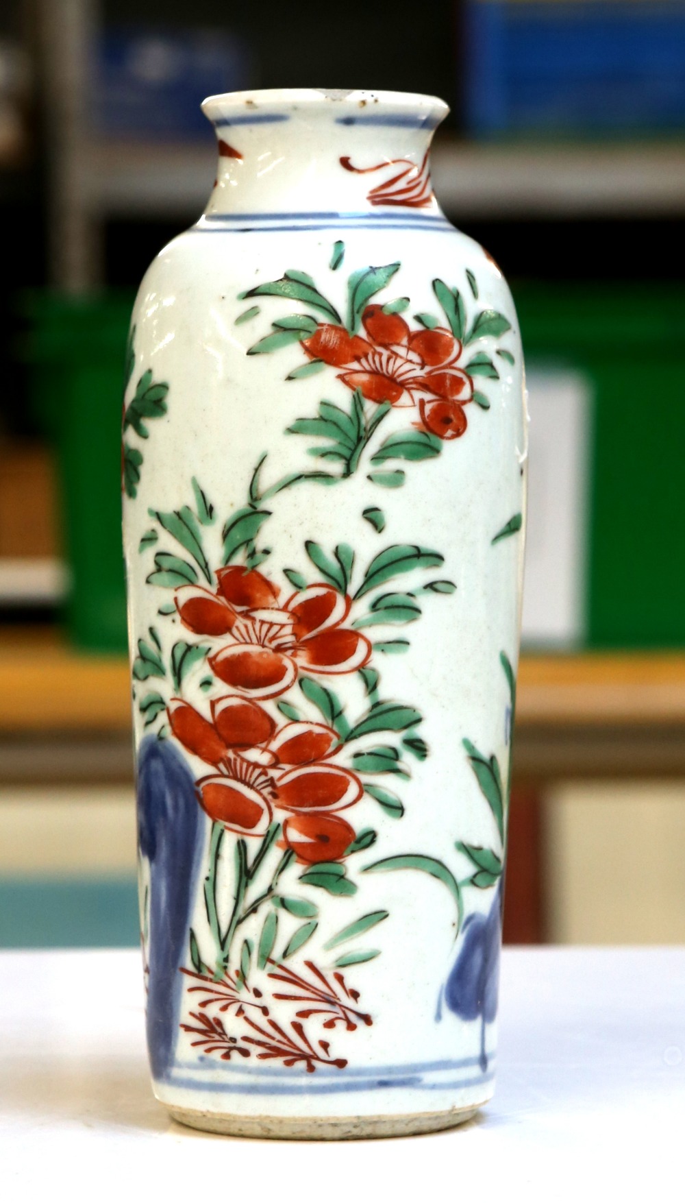 A small Transitional sleeve vase with unglazed base; decorated with orange-red flowers, green - Image 7 of 7