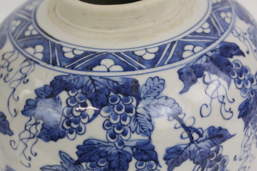 A blue and white vase with unglazed base, decorated with fruiting vine, 24 cm high; together with - Image 21 of 27