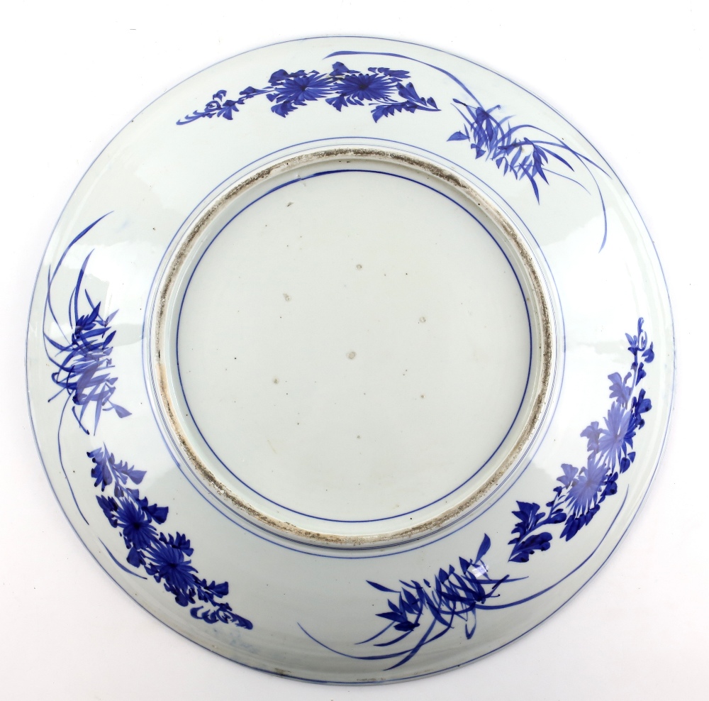A large Arita, or other area of sometsuke production, circular dish, decorated with kacho-ga, 56 - Image 2 of 2