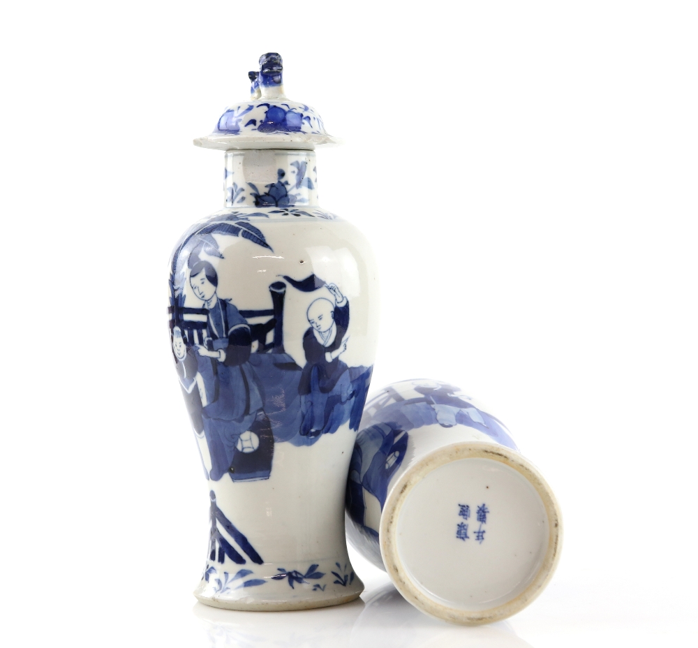 A pair of Chinese blue and white vases; each one with a domed cover and dog-of-fo finial, - Image 2 of 8