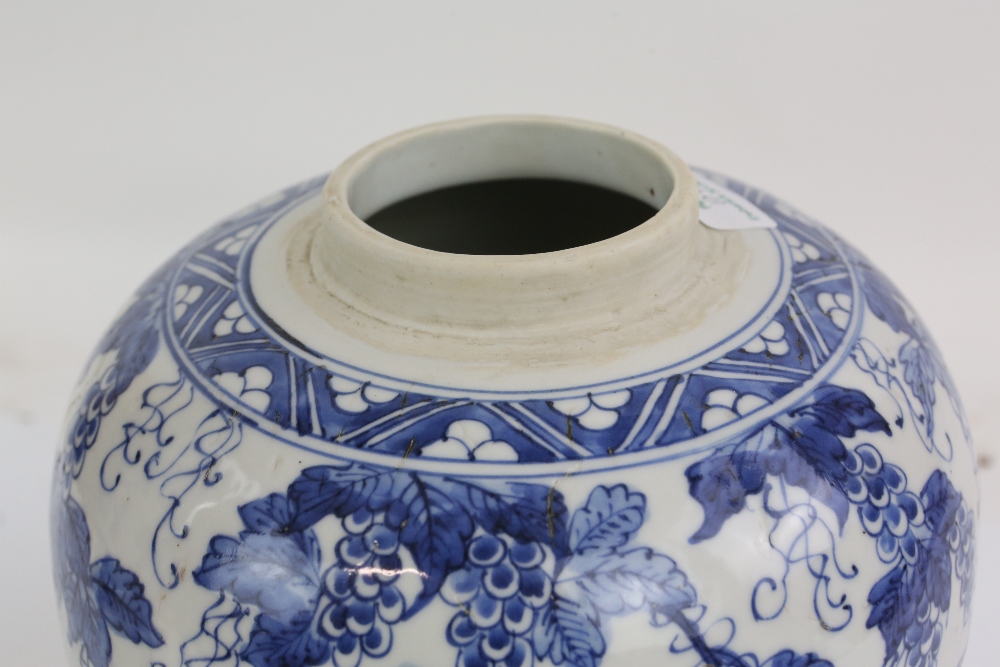 A blue and white vase with unglazed base, decorated with fruiting vine, 24 cm high; together with - Image 22 of 27