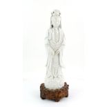 A Blanc-de-Chine standing figure of Guanyin, The Bodhisattva of Mercy, wearing a typical high