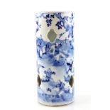 A blue and white hat stand of typical cylindrical and reticulated form, decorated with Manchu/