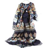 An elegant Chinese blue-ground, textile robe, decorated on the front with a bold design of a