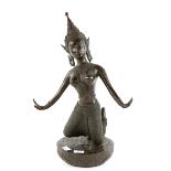 An Asian metal alloy figure of a dancer on integral circular base, 38cm high,.