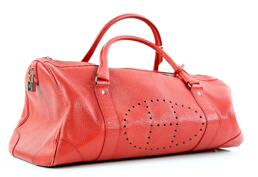 Bruno Magli peach coloured handbag with gold chain shoulder handle with dust bag and a red holdall. - Image 6 of 6