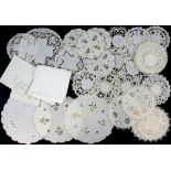 Embroidered place mats, cloths, doilies and other cloths and tea towels.