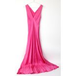 Two silk 1930s bias cut nightdresses one in shocking pink the other aqua and a shocking pink and