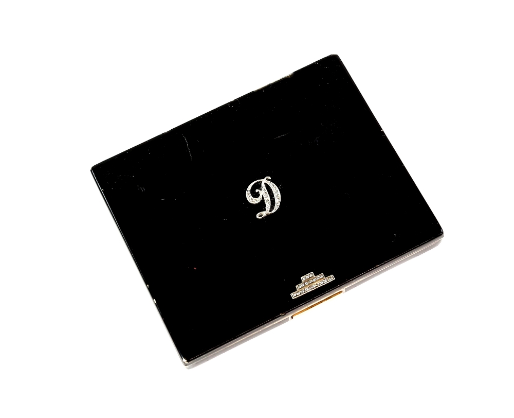 An Asprey Art Deco compact in silver and black enamel with diamanté inlay to the front formed as the - Image 2 of 7