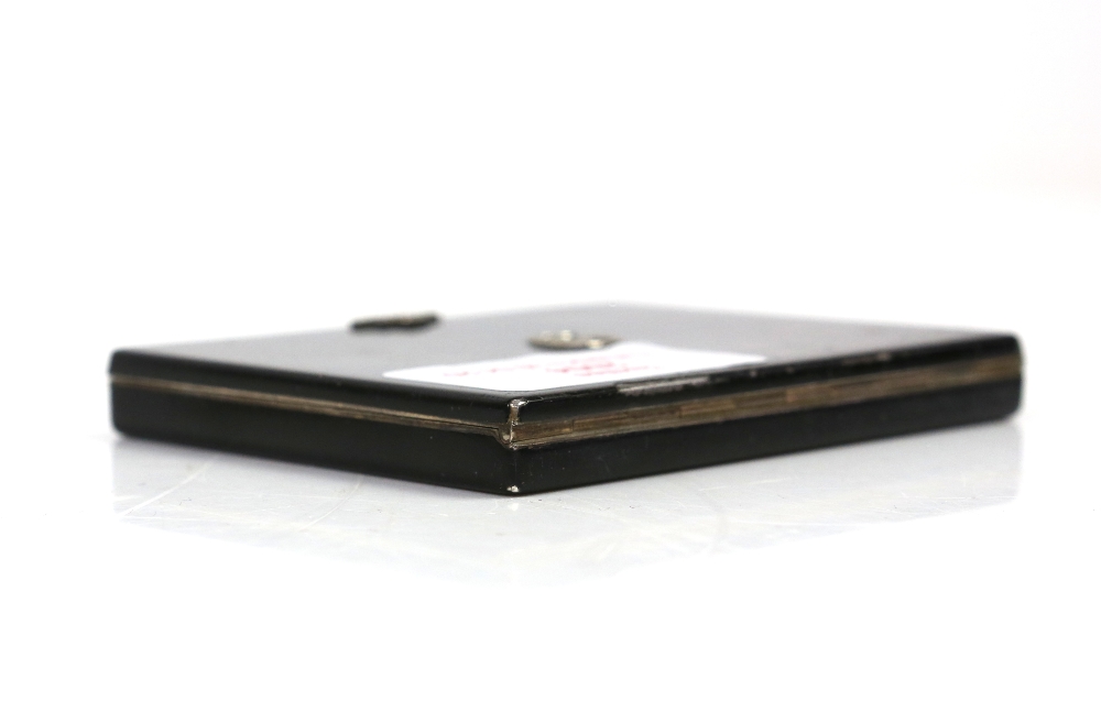 An Asprey Art Deco compact in silver and black enamel with diamanté inlay to the front formed as the - Image 5 of 7