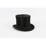 A Battersby and Co , London black silk top hat.