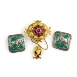 Victorian brooch of gilt metal set with paste stones, and green enamel buttons in Fortnum & Mason