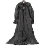 A Roland Klein taffeta full length evening coat in black together with cocktail, lace panelled