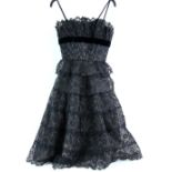 Collection of Vintage dresses to include an early 1960s black tiered lace cocktail dress, together