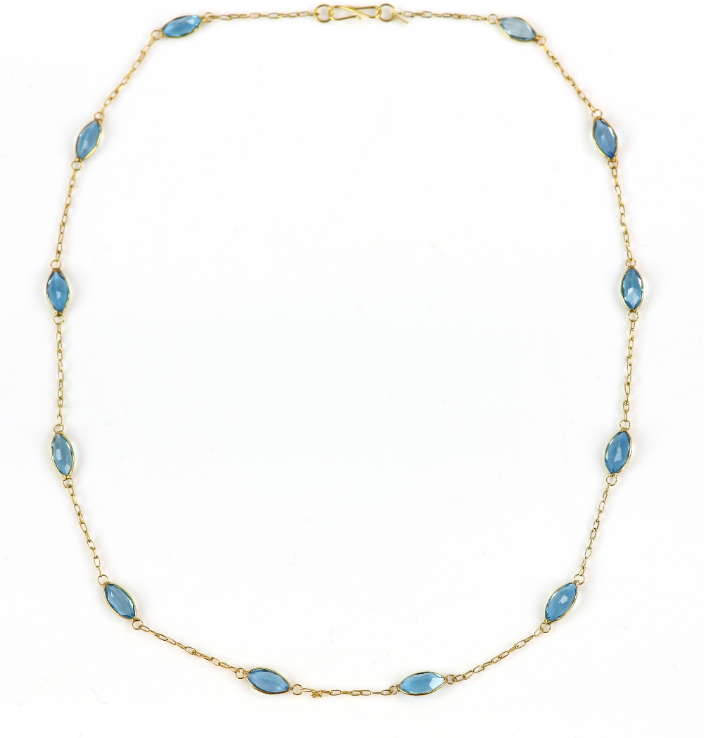 Blue topaz necklace; twelve marquise faceted blue topaz, spectacle set and connected with chain - Image 2 of 3