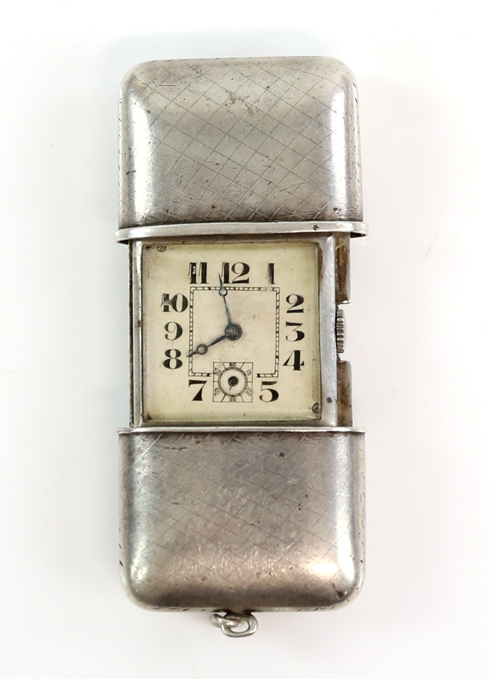 A silver ladies fob watch of rectangular outline, the case sliding open to reveal a square dial with