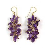 Amethyst drop earrings; oval faceted amethysts collet set in a 'grape' style setting, marked '585'