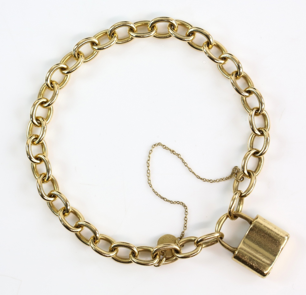 Tiffany & Co gold padlock bracelet, belcher links, in 18 ct yellow gold with safety chain. - Image 2 of 3