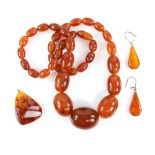 Amber earrings and pendant and a faux amber necklace, length 63 cm . CONDITION, good, necklace