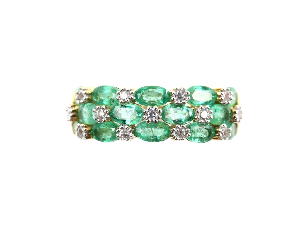 Modern emerald and white paste stone dress ring, mounted in 9 ct yellow gold, ring size OSold on