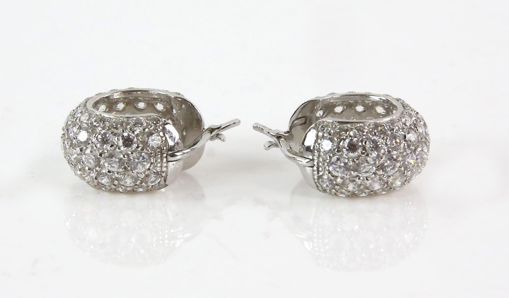 A pair of cubic zirconia pave set hoops, hinge clip fittings, mounted in 18 ct. CONDITION18 ct gross - Image 3 of 5