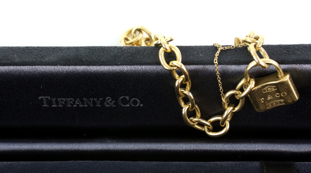 Tiffany & Co gold padlock bracelet, belcher links, in 18 ct yellow gold with safety chain. - Image 3 of 3