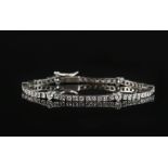 Diamond line bracelet, Art Deco style articulated geometric pattern, composed of six round cut