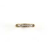 Diamond half eternity ring, set with brilliant cut stones, and diamond set shoulders in heart form