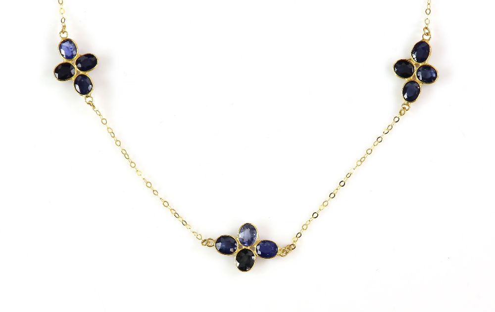 Sapphire cluster necklace; seven clusters of four oval faceted sapphires in floral formation - Image 2 of 4