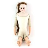 Continental bisque headed doll with open mouth, weighted blue eyes, short blonde hair and