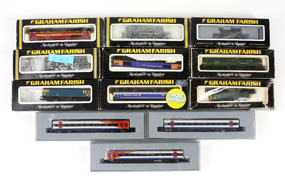 Twelve Graham Farish N gauge diesel locomotives and carriages, plus Dapol and other N gauge