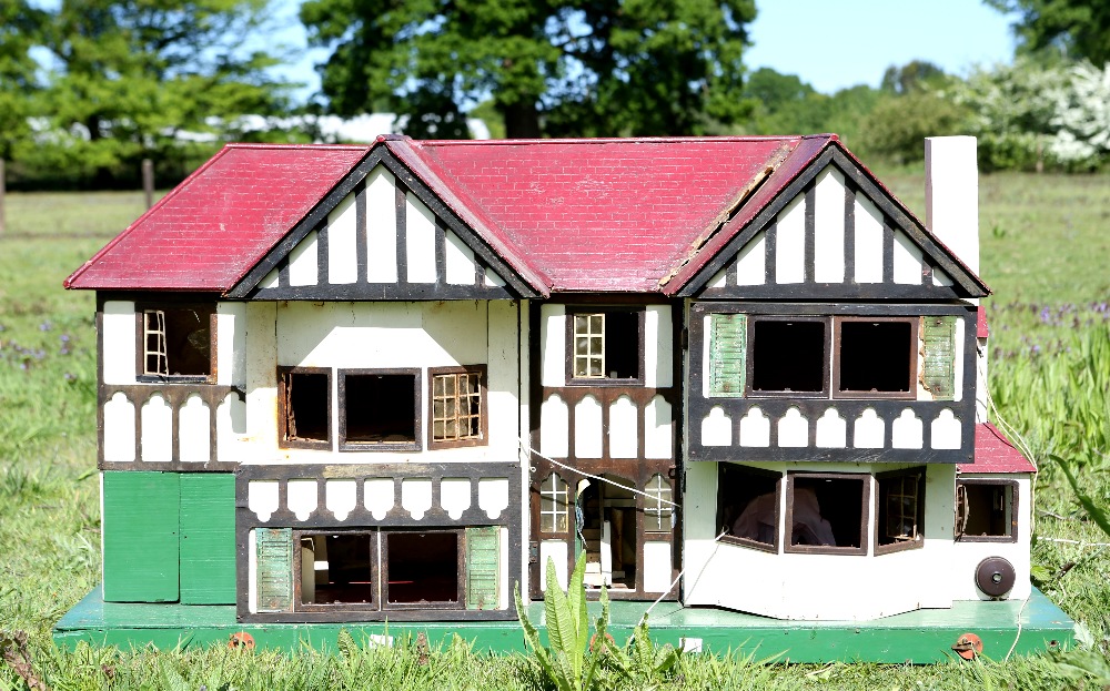 Tudor style dolls house with dolls house furniture, 63cm x 114cm x 44cm,