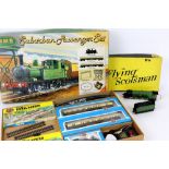 GMR 00 gauge 'Suburban Passenger Set', and Trix 'Flying Scotsman', (2), both boxed and complete,