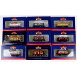 Thirteen Bachmann 00 gauge wagons, comprising 372017K 5-plank wagon 'M E Evans', 372016K 7-plank end