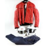 Motorbike gear including two helmets, one by Bell, Rokker jeans in wooden box (W 30 L 32), and a red