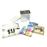 Music promotional items including Abba Singles Collection 1972-82 box set, U2 Staring At The Sun,