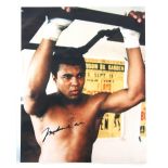 Boxing - Muhammad Ali (1942-2016) Signed 10 x 8 inch colour photograph.With certificate of