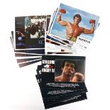 Three sets of 8 US Lobby cards for E.T. The Extra Terrestrial, Rocky III and Rocky IV, all 11 x 14