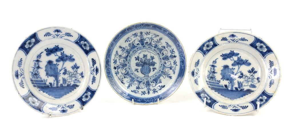 Pair of 18th century delft plates decorated in the Chinese taste, 23cm and another 23cm (3).