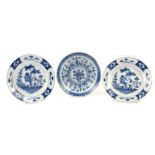 Pair of 18th century delft plates decorated in the Chinese taste, 23cm and another 23cm (3).