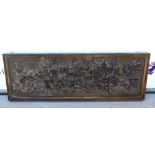 Early 20th century rectangular wooden wall panel, relief decorated with grape vines, 49 x 139cm .