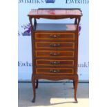 Inlaid mahogany music cabinet, five drawers raised on cabriole legs, 98 x 56 x 41cm. Break to