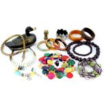 A group of costume jewellery including silver ring, stud earrings, bangles, mother-of-pearl set