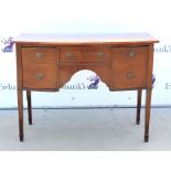 Georgian style mahogany bowfronted sideboard, with three drawers on square tapered legs to spade