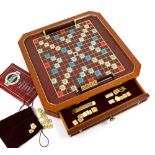 Collectors Edition Scrabble board set including book. Case measures 48cm x 48cm ; playing area 32.