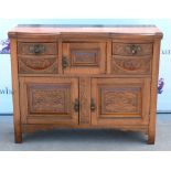 Early 20th century oak side cabinet with carved decoration, 91 x 118 x 45cm.