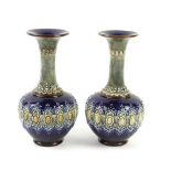 Pair of Royal Doulton onion shaped vases 20cm .