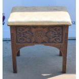 19th century oak stool, hinged seat with floral upholstery, carved with scrolling foliage, on square