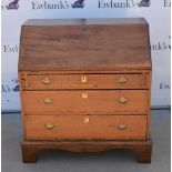 19th century mahogany bureau, the fall front with fitted interior above three graduating long