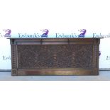 Carved oak panel, 63 x 152cm, together with a large oak overmantel, 49 x 204cm (2).